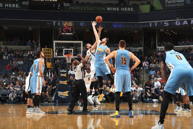 MEMPHIS, TN - NOVEMBER 8:  Deyonta Davis #23 of the Memphis Grizzlies and Jusuf Nurkic #23 of the Denver Nuggets jump for the ball on November 8, 2016 at FedExForum in Memphis, Tennessee. NOTE TO USER: User expressly acknowledges and agrees that, by downloading and or using this photograph, User is consenting to the terms and conditions of the Getty Images License Agreement. Mandatory Copyright Notice: Copyright 2016 NBAE (Photo by Joe Murphy/NBAE via Getty Images)