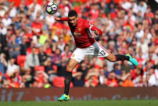 MANCHESTER, ENGLAND - OCTOBER 02: Chris Smalling of Manchester United heads the ball during the Premier League match between Manchester United and Stoke City at Old Trafford on October 2, 2016 in Manchester, England.  (Photo by Richard Heathcote/Getty Images)
