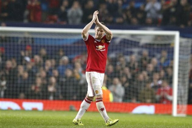 Manchester United's Bastian Schweinsteiger claps to fans as he leaves the pitch during the Champions League Group B soccer match between Manchester United and CSKA Moskva at Old Trafford Stadium, Manchester, England, Tuesday, Nov. 3, 2015. (AP Photo/Jon Super)