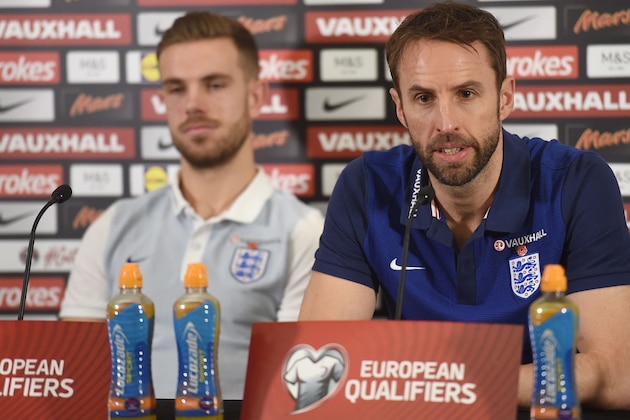 England's Interim manager Gareth Southgate (R) and England's midfielder Jordan Henderson attend a press conference at St George's Park in Burton-on-Trent on November 10, 2016, ahead of their group F World Cup qualifying football match against Scotland on November 11. / AFP / PAUL ELLIS / NOT FOR MARKETING OR ADVERTISING USE / RESTRICTED TO EDITORIAL USE         (Photo credit should read PAUL ELLIS/AFP/Getty Images)