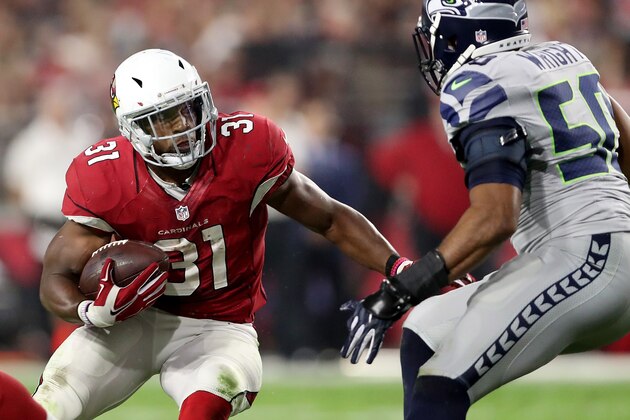 GLENDALE, AZ - OCTOBER 23:  Running back David Johnson #31 of the Arizona Cardinals rushes the football against the Seattle Seahawks during the NFL game at the University of Phoenix Stadium on October 23, 2016 in Glendale, Arizona. The Cardinals and Seahawks tied 6-6.  (Photo by Christian Petersen/Getty Images)