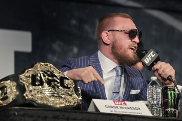 UFC featherweight champion Conor McGregor speaks during a news conference for UFC 205, Tuesday, Sept. 27, 2016, in New York. McGregor will challenge lightweight champion Eddie Alvarez for the lightweight belt on Nov. 12 in what will be the first UFC card to be held in New York after the state legislature legalized the sport earlier this year. (AP Photo/Julie Jacobson)