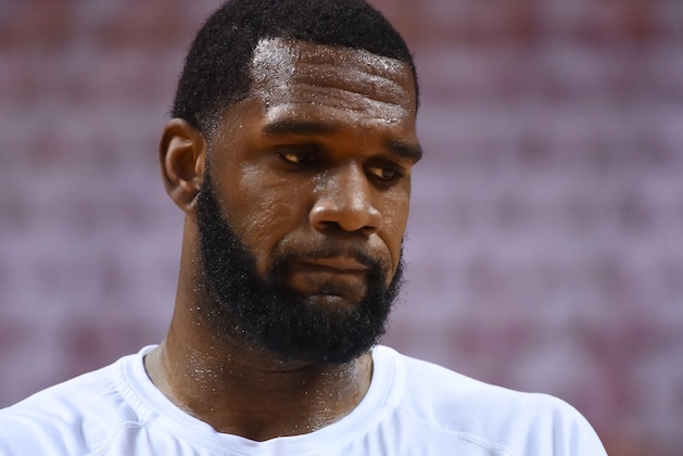 MIAMI, FL - MAY 30:  Greg Oden #20 of the Miami Heat looks on prior to Game Six of the Eastern Conference Finals of the 2014 NBA Playoffs against the Indiana Pacers at American Airlines Arena on May 30, 2014 in Miami, Florida. NOTE TO USER: User expressly acknowledges and agrees that, by downloading and/or using this photograph, user is consenting to the terms and conditions of the Getty Images License Agreement.  (Photo by Ron Elkman/Sports Imagery/ Getty Images)