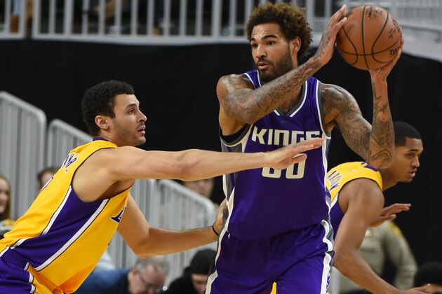 LAS VEGAS, NV - OCTOBER 13:  Willie Cauley-Stein #00 of the Sacramento Kings is guarded by Larry Nance Jr. #7 of the Los Angeles Lakers during their preseason game at T-Mobile Arena on October 13, 2016 in Las Vegas, Nevada. Sacramento won 116-104. NOTE TO USER: User expressly acknowledges and agrees that, by downloading and or using this photograph, User is consenting to the terms and conditions of the Getty Images License Agreement.  (Photo by Ethan Miller/Getty Images)
