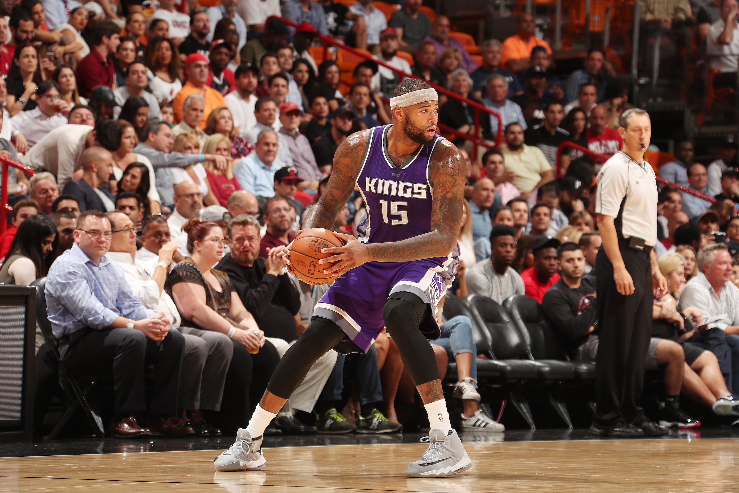 MIAMI, FL - NOVEMBER 1:   DeMarcus Cousins #15 of the Sacramento Kings handles the ball against the Miami Heat on November 1, 2016 at American Airlines Arena in Miami, Florida. NOTE TO USER: User expressly acknowledges and agrees that, by downloading and or using this Photograph, user is consenting to the terms and conditions of the Getty Images License Agreement. Mandatory Copyright Notice: Copyright 2016 NBAE (Photo by Issac Baldizon/NBAE via Getty Images)
