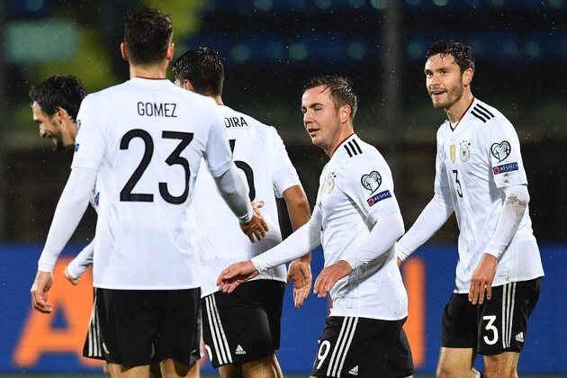 German defender Jonas Hector (C) celebrates with teammates after scoring a goal during the World Cup 2018 qualifying football match between San Marino and Germany on November 11, 2016 at the San Marino stadium in Serravalle. / AFP / VINCENZO PINTO        (Photo credit should read VINCENZO PINTO/AFP/Getty Images)
