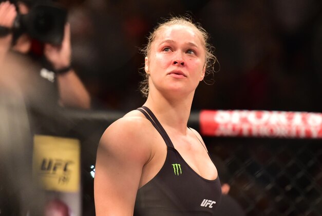 Aug 1, 2015; Rio de Janeiro, RJ, Brazil; Ronda Rousey (red gloves) reacts after knocking out Bethe Correia (not pictured) during UFC 190 at HSBC Arena. Mandatory Credit: Jason Silva-USA TODAY Sports