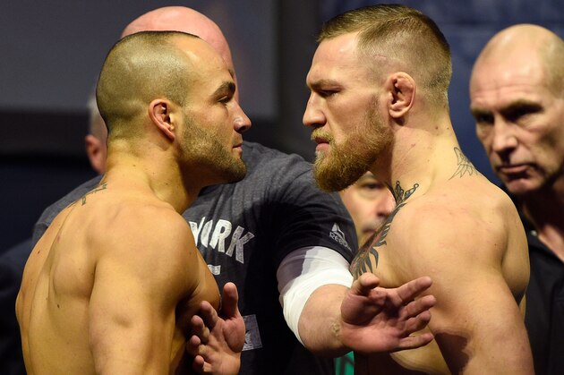 NEW YORK, NY - NOVEMBER 11:  UFC lightweight champion Eddie Alvarez and Conor McGregor of Ireland face off during the UFC 205 weigh-in inside Madison Square Garden on November 11, 2016 in New York City. (Photo by Jeff Bottari/Zuffa LLC/Zuffa LLC via Getty Images)