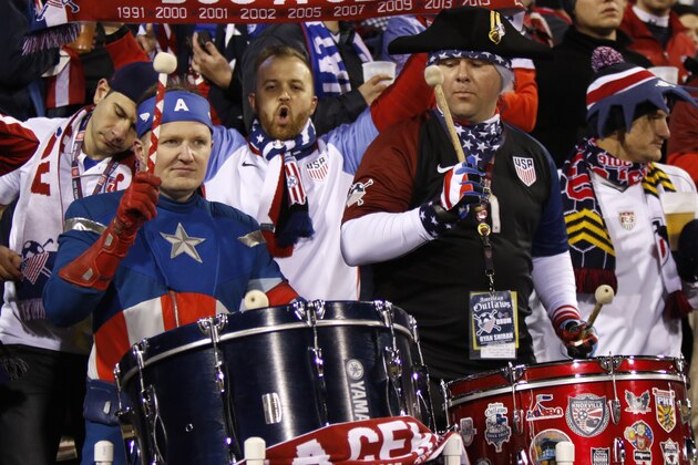US soccer fans cheer before the start of a 2018 FIFA World Cup qualifying match between the Mexico men's national team and the US men's national team in Columbus, Ohio on November 11, 2016. / AFP / Paul Vernon        (Photo credit should read PAUL VERNON/AFP/Getty Images)