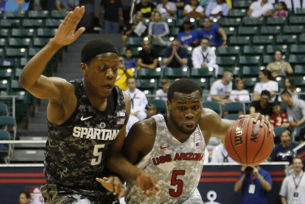 Nov 11, 2016; Honolulu, HI, USA; Arizona Wildcats guard Kadeem Allen (5) drives to the basket against Michigan State Spartans guard Cassius Winston (5) at the Stan Sheriff Center . Mandatory Credit: Brian Spurlock-USA TODAY Sports