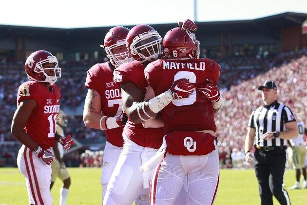 NORMAN, OK - NOVEMBER 12: Quarterback Baker Mayfield #6 of the Oklahoma Sooners celebrates a touchdown against the Baylor Bears November 12, 2016 at Gaylord Family-Oklahoma Memorial Stadium in Norman, Oklahoma. (Photo by Brett Deering/Getty Images)