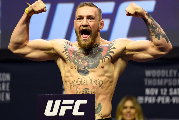 NEW YORK, NY - NOVEMBER 11:  Conor McGregor of Ireland steps onto the scale during the UFC 205 weigh-in inside Madison Square Garden on November 11, 2016 in New York City. (Photo by Jeff Bottari/Zuffa LLC/Zuffa LLC via Getty Images)