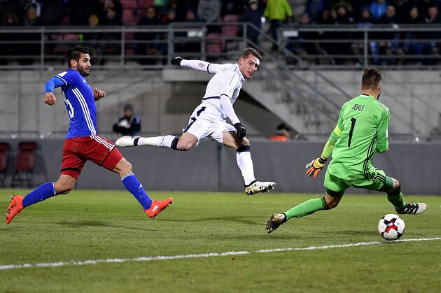 Italy's forward Andrea Belotti (C) scores his team's fourth goal past Liechtenstein's defender Michele Polverino (L) and Liechtenstein's goalkeeper Peter Jehle during the FIFA World Cup 2018 European zone group G qualifying football match beetween Liechtenstein and Italy at the Rheinpark Stadion in Vaduz on November 12, 2016. / AFP / FABRICE COFFRINI        (Photo credit should read FABRICE COFFRINI/AFP/Getty Images)