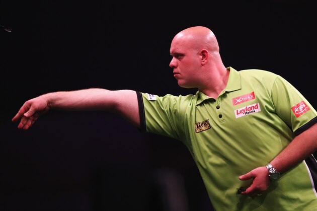 ROTTERDAM, NETHERLANDS - MAY 12:  Michael van Gerwen of the Netherlands plays a shot in his match against Phil 'The Power' Taylor of England during the Darts Betway Premier League Night 15 at Rotterdam Ahoy on May 12, 2016 in Rotterdam, .  (Photo by Dean Mouhtaropoulos/Getty Images)