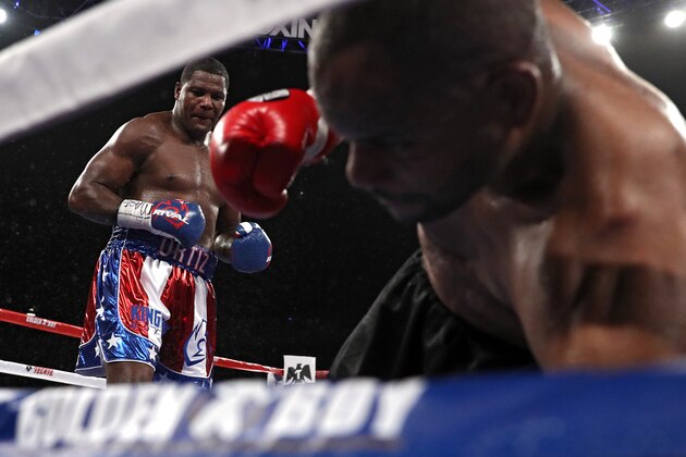 WASHINGTON, DC - MARCH 05: Luis Ortiz (left) knocks out Tony Thompson in their main event heavyweight match at the DC Armory on March 5, 2016 in Washington, DC. (Photo by Patrick Smith/Getty Images)