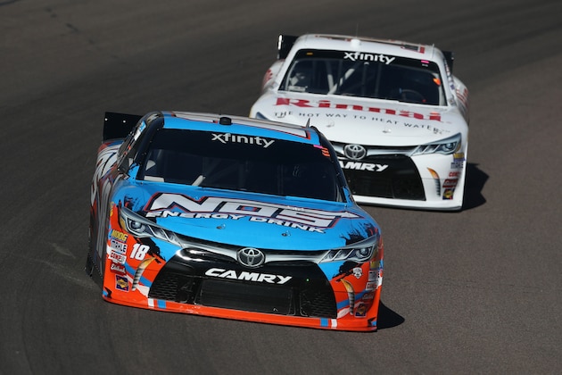 AVONDALE, AZ - NOVEMBER 11: Kyle Busch, driver of the #18 NOS Energy Drink Toyota, leads Cole Whitt, driver of the #14 Rinnai Toyota, during practice for the NASCAR XFINITY Series Ticket Galaxy 200 at Phoenix International Raceway on November 11, 2016 in Avondale, Arizona.  (Photo by Christian Petersen/Getty Images)