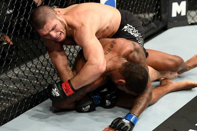 NEW YORK, NY - NOVEMBER 12:  Michael Johnson of the United States (bottom) fights against Khabib Nurmagomedov of Russia in their lightweight bout during the UFC 205 event at Madison Square Garden on November 12, 2016 in New York City.  (Photo by Jeff Bottari/Zuffa LLC/Zuffa LLC via Getty Images)