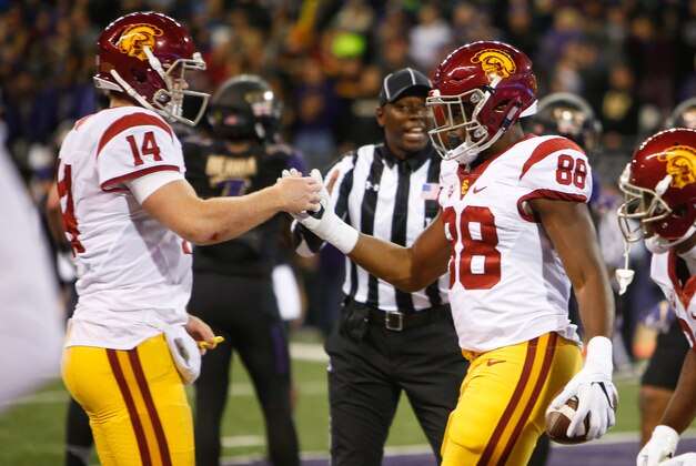 Nov 12, 2016; Seattle, WA, USA; USC Trojans quarterback Sam Darnold (14) and USC Trojans tight end Daniel Imatorbhebhe (88) celebrate a touchdown pass and catch against the Washington Huskies during the fourth quarter at Husky Stadium. Mandatory Credit: Joe Nicholson-USA TODAY Sports