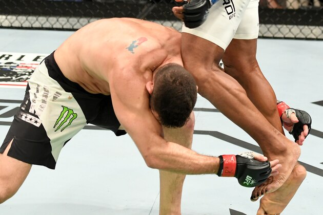NEW YORK, NY - NOVEMBER 12:  Chris Weidman of the United States (left) fights against Yoel Romero of Cuba in their middleweight bout during the UFC 205 event at Madison Square Garden on November 12, 2016 in New York City.  (Photo by Jeff Bottari/Zuffa LLC/Zuffa LLC via Getty Images)