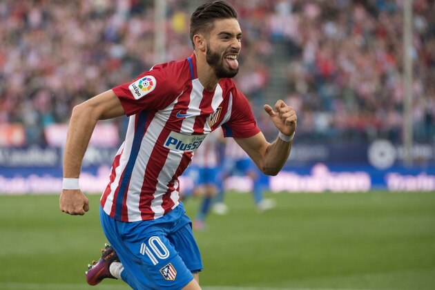 Atletico Madrid's Belgian midfielder Yannick Ferreira Carrasco celebrates a goal during the Spanish league football match between Club Atletico de Madrid and Malaga CF at the Vicente Calderon stadium in Madrid on October 29, 2016. / AFP / CURTO DE LA TORRE        (Photo credit should read CURTO DE LA TORRE/AFP/Getty Images)