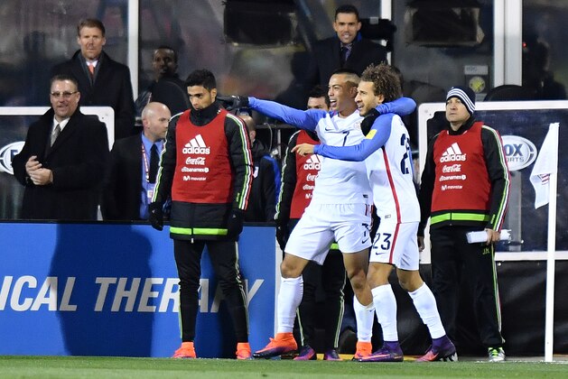 COLUMBUS, OH - NOVEMBER 11: Bobby Wood #7 of the United States celebrates with teammate Fabian Johnson #23 after scoring a second half goal against Mexico during the FIFA 2018 World Cup Qualifier at MAPFRE Stadium on November 11, 2016 in Columbus, Ohio. (Photo by Jamie Sabau/Getty Images)