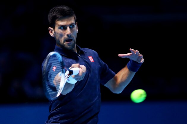 LONDON, ENGLAND - NOVEMBER 13:  Novak Djokovic of Serbia hits a forehand during his men's singles match against Dominic Thiem of Austria on day one of the ATP World Tour Finals at O2 Arena on November 13, 2016 in London, England.  (Photo by Clive Brunskill/Getty Images)