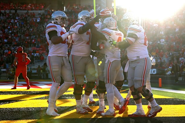 COLLEGE PARK, MD - NOVEMBER 12: Running back Curtis Samuel #4 of the Ohio State Buckeyes celebrates with teammates after scoring a touchdown against the Maryland Terrapins in the first quarter at Capital One Field at Maryland Stadium on November 12, 2016 in College Park, Maryland. (Photo by Patrick Smith/Getty Images)