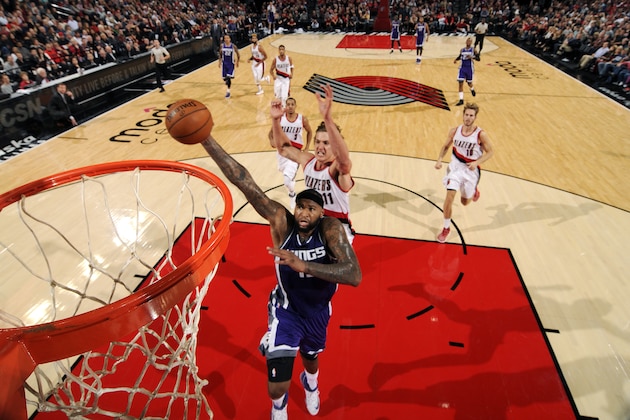 PORTLAND, OR - NOVEMBER 11: DeMarcus Cousins #15 of the Sacramento Kings goes for the dunk during the game against the Portland Trail Blazers on November 11, 2016 at the Moda Center in Portland, Oregon. NOTE TO USER: User expressly acknowledges and agrees that, by downloading and or using this Photograph, user is consenting to the terms and conditions of the Getty Images License Agreement. Mandatory Copyright Notice: Copyright 2016 NBAE (Photo by Cameron Browne/NBAE via Getty Images)