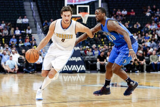 Oct 21, 2016; Denver, CO, USA; Denver Nuggets forward Danilo Gallinari (8) dribbles the ball against Dallas Mavericks forward Harrison Barnes (40) in the first quarter at the Pepsi Center. Mandatory Credit: Isaiah J. Downing-USA TODAY Sports