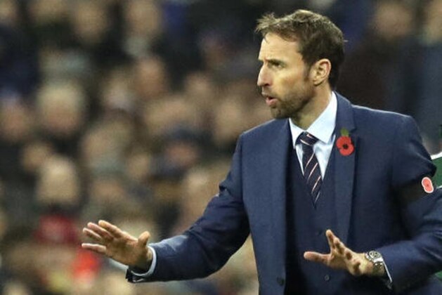 England's interim manager Gareth Southgate gestures during the World Cup group F qualifying soccer match between England and Scotland at the Wembley stadium, London, Friday, Nov. 11, 2016. (AP Photo/Matt Dunham)