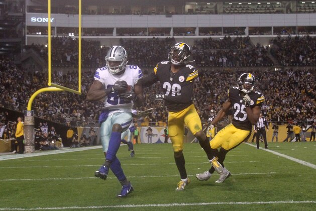 Nov 13, 2016; Pittsburgh, PA, USA;  Dallas Cowboys wide receiver Dez Bryant (88) scores a touchdown past Pittsburgh Steelers safety Sean Davis (28) and cornerback Artie Burns (25)during the second half of their game at Heinz Field. The Cowboys won the game, 35-30. Mandatory Credit: Jason Bridge-USA TODAY Sports
