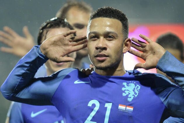 Netherland's Memphis Depay reacts after scoring the1-3 goal against Luxembourg during their World Cup Group A qualifying soccer match at the Josy Barthel stadium in Luxembourg on Sunday, Nov 13, 2016. (AP Photo/Laurent Dubrule)