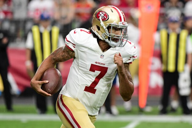 Nov 13, 2016; Glendale, AZ, USA;  San Francisco 49ers quarterback Colin Kaepernick (7) runs the ball during the first half against the Arizona Cardinals at University of Phoenix Stadium. Mandatory Credit: Matt Kartozian-USA TODAY Sports
