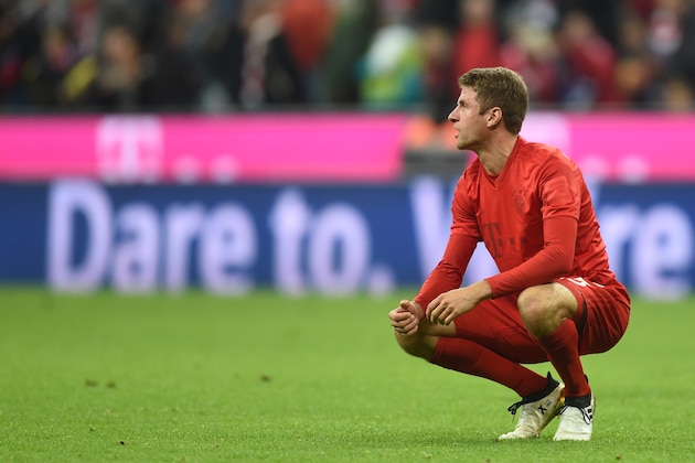 Bayern Munich's forward Thomas Mueller sits on the pitch during the German first division Bundesliga match between the FC Bayern Munich and TSG 1899 Hoffenheim in Munich, southern Germany, on November 5, 2016. / AFP / CHRISTOF STACHE / RESTRICTIONS: DURING MATCH TIME: DFL RULES TO LIMIT THE ONLINE USAGE TO 15 PICTURES PER MATCH AND FORBID IMAGE SEQUENCES TO SIMULATE VIDEO. == RESTRICTED TO EDITORIAL USE == FOR FURTHER QUERIES PLEASE CONTACT DFL DIRECTLY AT + 49 69 650050
        (Photo credit should read CHRISTOF STACHE/AFP/Getty Images)