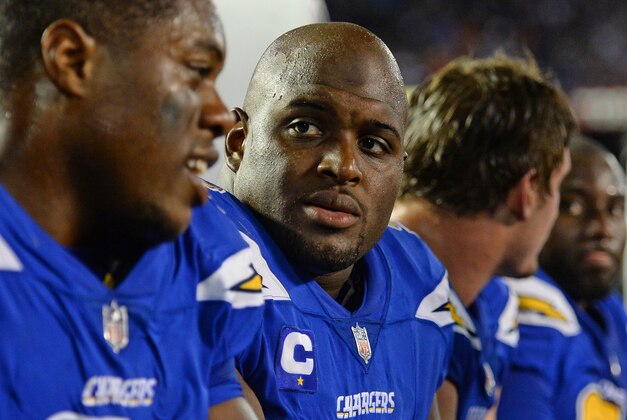 Oct 13, 2016; San Diego, CA, USA; San Diego Chargers nose tackle Brandon Mebane (center) talks to defensive tackle Caraun Reid (left) during the fourth quarter against the Denver Broncos at Qualcomm Stadium. Mandatory Credit: Jake Roth-USA TODAY Sports