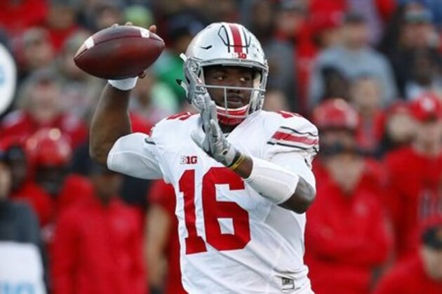 Ohio State quarterback J.T. Barrett throws to a receiver in the first half of an NCAA college football game against Maryland in College Park, Md., Saturday, Nov. 12, 2016. (AP Photo/Patrick Semansky)