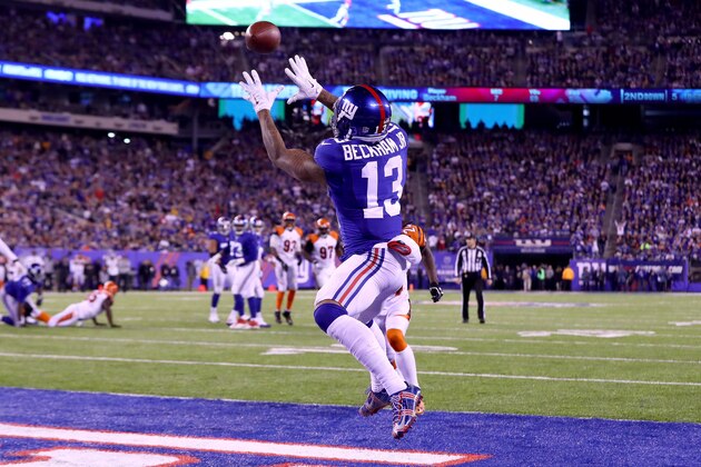 EAST RUTHERFORD, NJ - NOVEMBER 14:  Odell Beckham Jr. #13 of the New York Giants catches a touchdown pass against the Cincinnati Bengals during the second quarter of the game at MetLife Stadium on November 14, 2016 in East Rutherford, New Jersey.  (Photo by Al Bello/Getty Images)