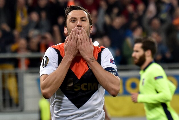 FC Shakhtar's Darijo Srna celebrates after scoring a goal during the UEFA Europa League quarter finals second leg football match between SC Braga and FC Shakhtar Donetsk on April 14, 2016 at the Arena Lviv stadium in Lviv.  / AFP / SERGEI SUPINSKY        (Photo credit should read SERGEI SUPINSKY/AFP/Getty Images)