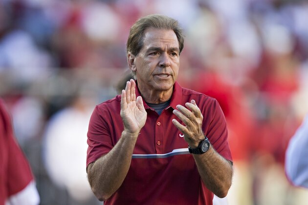 FAYETTEVILLE, AR - OCTOBER 8:  Head Coach Nick Saban of the Alabama Crimson Tide watches the team warm up before a game against the Arkansas Razorbacks at Razorback Stadium on October 8, 2016 in Fayetteville, Arkansas.  The Crimson Tide defeated the Razorbacks 49-30.  (Photo by Wesley Hitt/Getty Images)