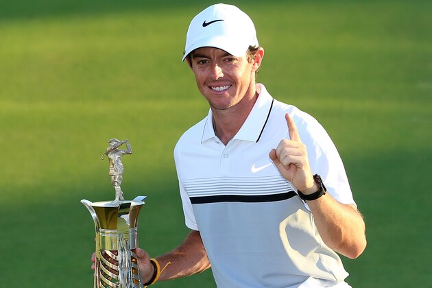 DUBAI, UNITED ARAB EMIRATES - NOVEMBER 22:  Rory McIlroy of Northern Ireland Rory McIlroy of Northern Ireland poses with the Race To Dubai trophy following the final round of the DP World Tour Championship on the Earth Course at Jumeirah Golf Estates on November 22, 2015 in Dubai, United Arab Emirates.  (Photo by Andrew Redington/Getty Images)