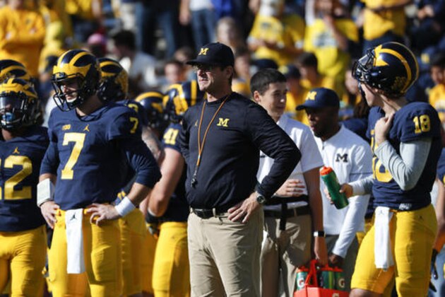 Michigan Wolverines head coach Jim Harbaugh watches during an NCAA college football game against the Maryland Terrapins in Ann Arbor, Mich., Saturday, Nov. 5, 2016. (AP Photo/Paul Sancya)