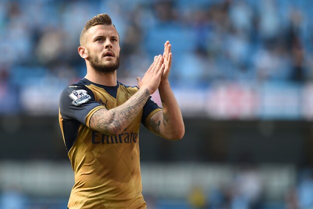 Arsenal's English midfielder Jack Wilshere applauds fans after the English Premier League football match between Manchester City and Arsenal at the Etihad Stadium in Manchester, north west England, on May 8, 2016. / AFP / PAUL ELLIS / RESTRICTED TO EDITORIAL USE. No use with unauthorized audio, video, data, fixture lists, club/league logos or 'live' services. Online in-match use limited to 75 images, no video emulation. No use in betting, games or single club/league/player publications.  /         (Photo credit should read PAUL ELLIS/AFP/Getty Images)