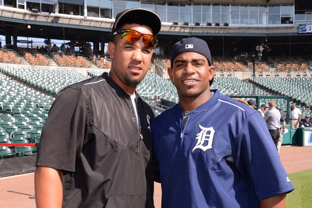 DETROIT, MI - APRIL 18:  Jose Abreu #79 of the Chicago White Sox and Yoenis Cespedes #52 of the Detroit Tigers pose for a photo prior to the game against the Detroit Tigers at Comerica Park on April 18, 2015 in Detroit, Michigan. The White Sox defeated the Tigers 12-3.  (Photo by Mark Cunningham/MLB Photos via Getty Images)