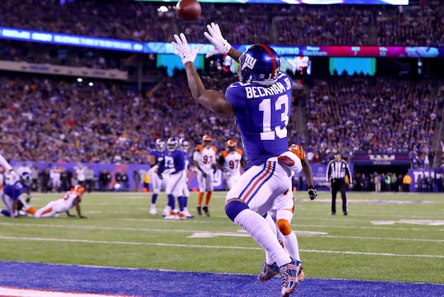 EAST RUTHERFORD, NJ - NOVEMBER 14:  Odell Beckham Jr. #13 of the New York Giants catches a touchdown pass against the Cincinnati Bengals during the second quarter of the game at MetLife Stadium on November 14, 2016 in East Rutherford, New Jersey.  (Photo by Al Bello/Getty Images)