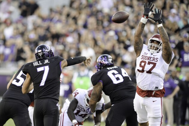 FORT WORTH, TX - OCTOBER 01: Defensive lineman Charles Walker #97 of the Oklahoma Sooners jumps up to deflect a pass from quarterback Kenny Hill #7 of the TCU Horned Frogs at Amon G. Carter Stadium on October 1, 2016 in Fort Worth, Texas. (Photo by Joshua Gateley/Getty Images)