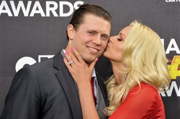 The Miz, left, and Maryse Ouellet arrive at the 4th Annual Hall of Game Awards on Saturday, Feb, 15, 2014 in Santa Monica, Calif. (Photo by Richard Shotwell/Invision/AP)