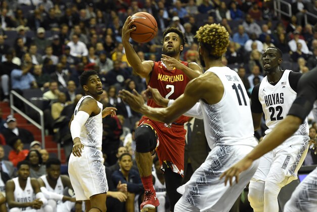 Nov 15, 2016; Washington, DC, USA;  Maryland Terrapins guard Melo Trimble (2) looks to shoot in front of Georgetown Hoyas forward Isaac Copeland (11) during the first half at Verizon Center. Mandatory Credit: Tommy Gilligan-USA TODAY Sports