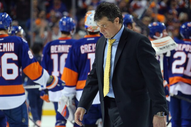 NEW YORK, NY - APRIL 24: Jack Capuano of the New York Islanders leaves the ice following a 2-1 victory over the Florida Panthers in Game Six of the Eastern Conference First Round during the 2016 NHL Stanley Cup Playoffs at the Barclays Center on April 24, 2016 in the Brooklyn borough of New York City. The Islanders won the game 2-1 to win the series four games to two. (Photo by Bruce Bennett/Getty Images)