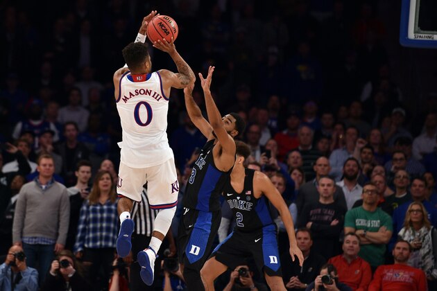 NEW YORK, NY - NOVEMBER 15: Frank Mason III #0 of the Kansas Jayhawks puts up the game-winning shot against Matt Jones #13 of the Duke Blue Devils with three seconds remaining in the game during the State Farm Champions Classic at Madison Square Garden on November 15, 2016 in New York City. Kansas won 77-75. (Photo by Lance King/Getty Images) NEW YORK, NY - NOVEMBER 15: Frank Mason III #0 of the Kansas Jayhawks puts up the game-winning shot against Matt Jones #13 of the Duke Blue Devils with three seconds remaining in the game during the State Farm Champions Classic at Madison Square Garden on November 15, 2016 in New York City. Kansas won 77-75. (Photo by Lance King/Getty Images)