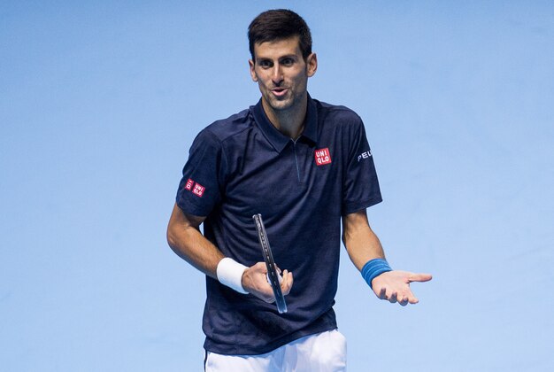 LONDON, ENGLAND - NOVEMBER 15:  Novak Djokovic of Serbia reacts during his men's singles match against Milos Raonic of Canada on day three of the ATP World Tour Finals at O2 Arena on November 15, 2016 in London, England.  (Photo by Justin Setterfield/Getty Images)
